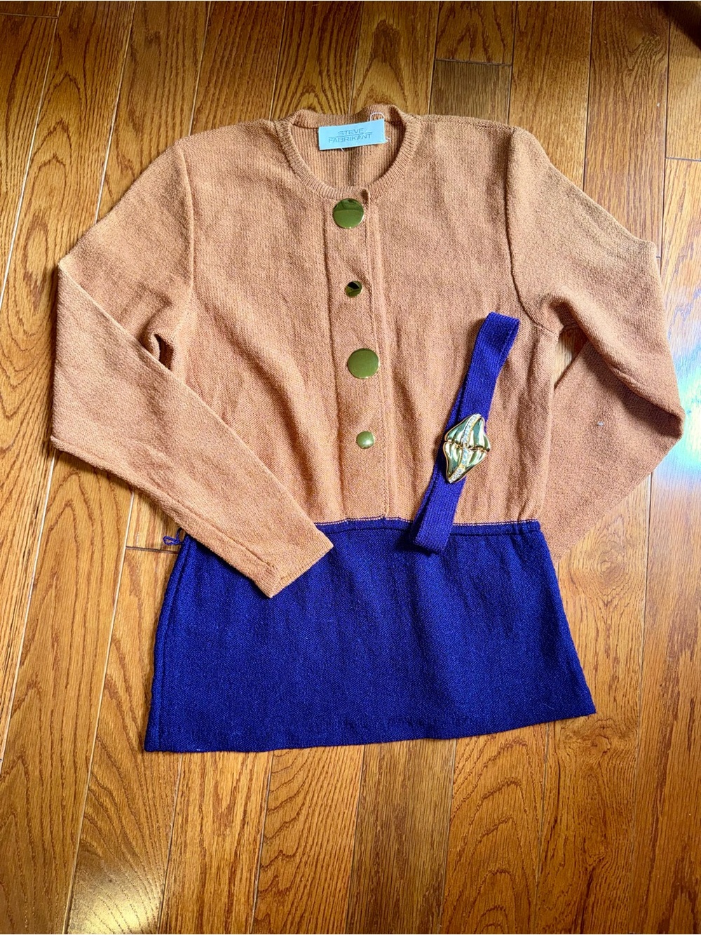 Steve Fabrikant brand vintage two-tone knit sweater in orange and purple.